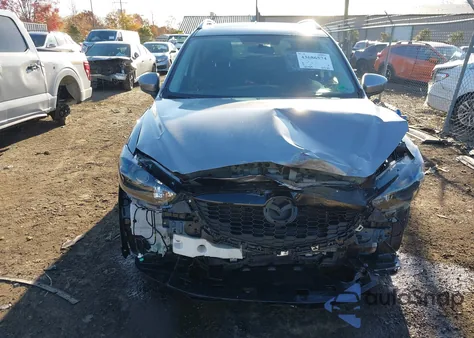 2014 Mazda Cx-5 Touring z USA, uszkodzony, nr VIN JM3KE4CY3E0393283